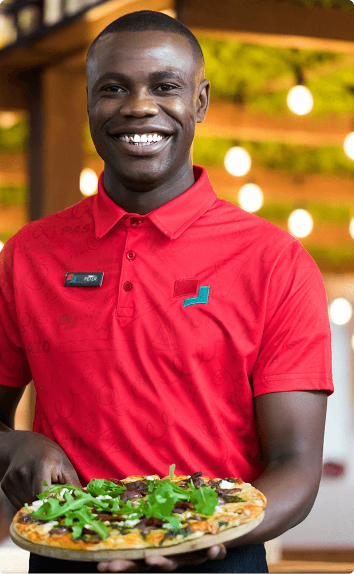 Waiter holding a pizza