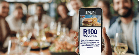 Customer presenting a voucher code at a restaurant